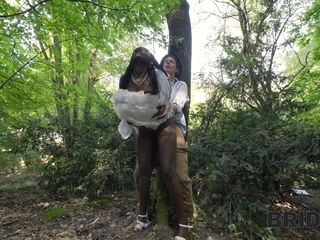 Amazing black girl dressed like a bride has passionate sex with her lover outside in the woods