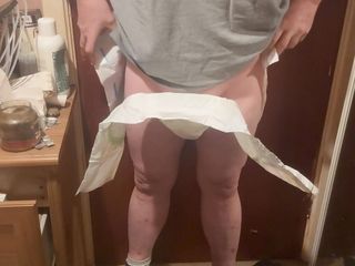 Showing off a tinimals nappie diaper