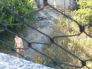 My wife walking totally naked outdoor